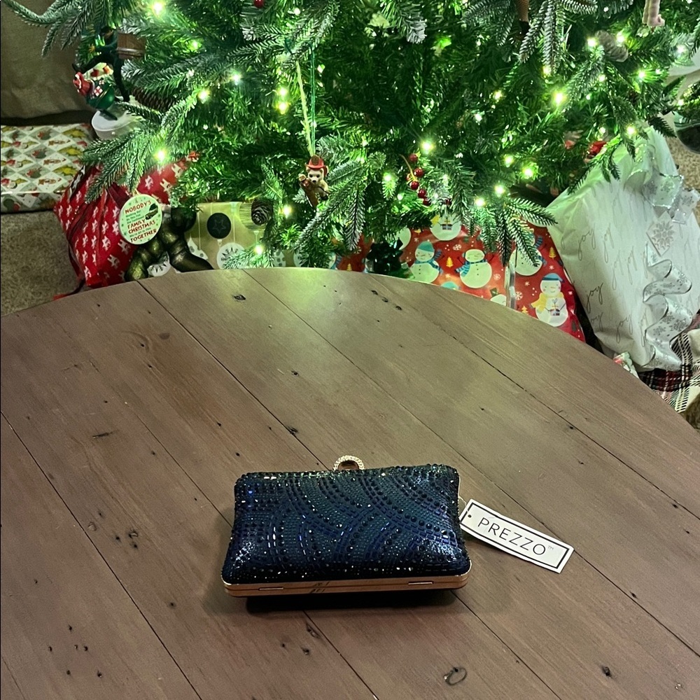 Prezzo Blue Sparkly Clutch Bag​​